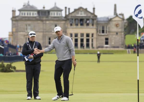 Jordan Spieth gets a feel for the first green on the Old Course during his practice round at St Andrews yesterday. Picture: AP
