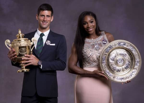 Wimbledon mens and womens singles champions Novak Djokovic and Serena Williams pose with their trophies at the Champions Dinner at Londons Guildhall. Picture: AFP/Getty
