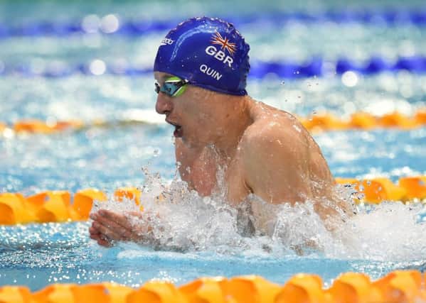 Edinburgh-born Scott Quin competes for Team GB in the 100m breaststroke SB14 final. Picture: SNS