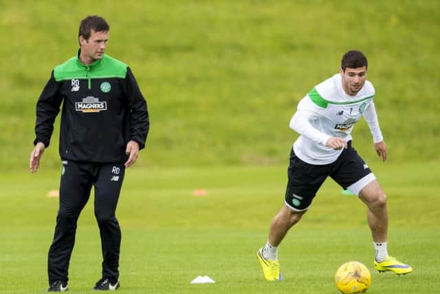 Celtic boss Ronny Deila watches his new signing Nadir Ciftci in training at Lennoxtown. Picture: SNS