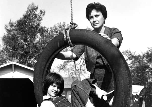 Author Harper Lee with actress Mary Badham, who played Scout, on set of the film To Kill A Mockingbird in 1962. Picture: Everett Collection / Rex Feature