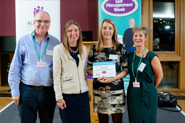 Donna Barrowman, centre right, wins Self Management Champion of the Year, received from Aileen McLeod MSP, centre left. Picture: Marc Millar