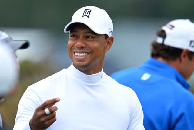 Tiger Woods in relaxed mood during his practice round at St Andrews. Picture: AFP