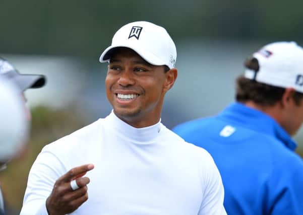 Tiger Woods in relaxed mood during his practice round at St Andrews. Picture: AFP
