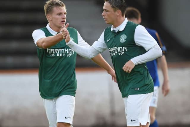 Hibernian's Scott Allan (right) celebrates after making it 3-0. Picture: SNS