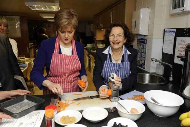 First Minister Nicola Sturgeon with new poverty advisor Naomi Eisenstadt during a visit to the Cyrenians charity in Edinburgh. Picture: PA