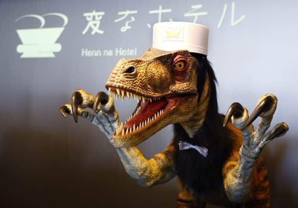 A dapper dinosaur is the English robo-receptionist. Picture: AP