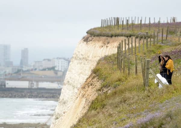 Tributes are placed at the site where Arthur Cave fell. Picture: SWNS