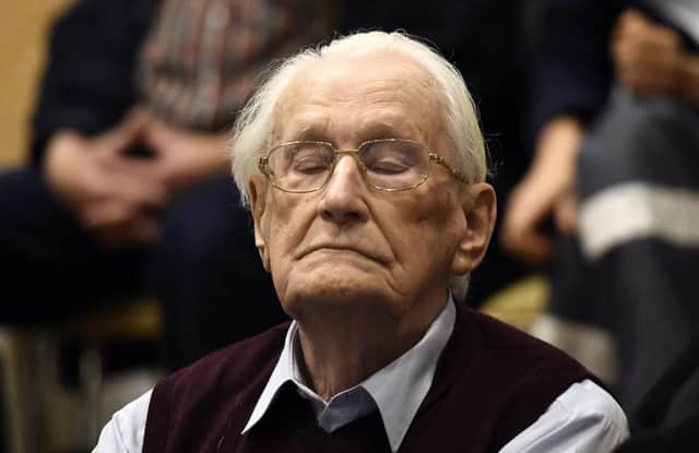 Former SS officer Oskar Groening listens to the verdict of his trial. Picture: AFP/Getty