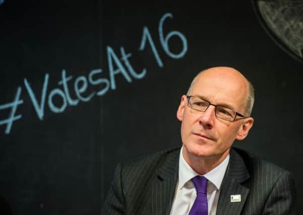 John Swinney attends a debate on lowering the voting age - 16 and 17-year-olds were able to vote in Scotland's independence referendum. Picture: TSPL