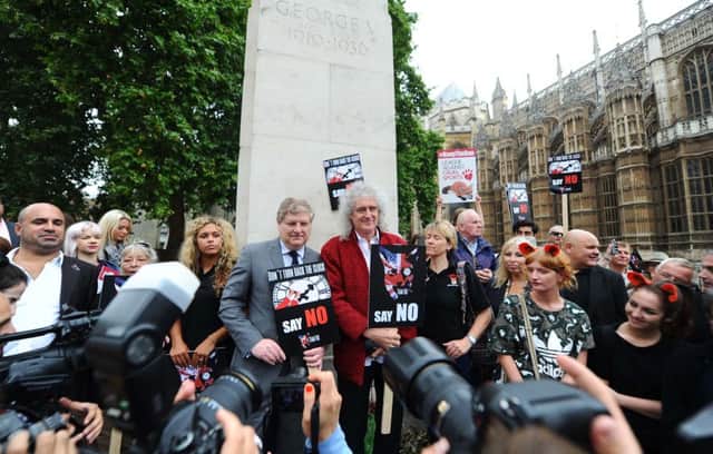 Brian May and Angus Robertson from the SNP at an anti-fox hunting rally this week. Picture: Getty