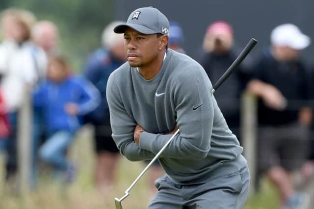 Tiger Woods, on the third green yesterday, hopes for a John Dalystyle miracle. Picture: Jane Barlow
