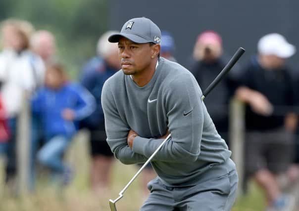 Tiger Woods, on the third green yesterday, hopes for a John Dalystyle miracle. Picture: Jane Barlow