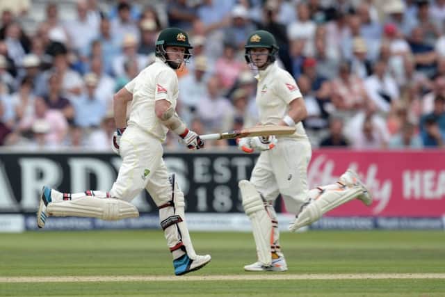 Chris Rogers, left, and Steve Smith put runs on the board during the first day of the Second Test at Lords. Picture: PA