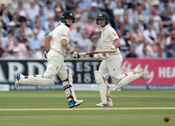 Chris Rogers, left, and Steve Smith put runs on the board during the first day of the Second Test at Lords. Picture: PA