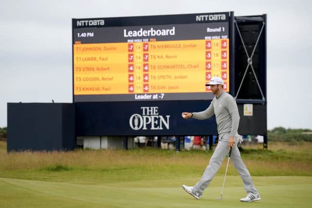 Dustin Johnson strides across the 15th green. Picture: Jane Barlow