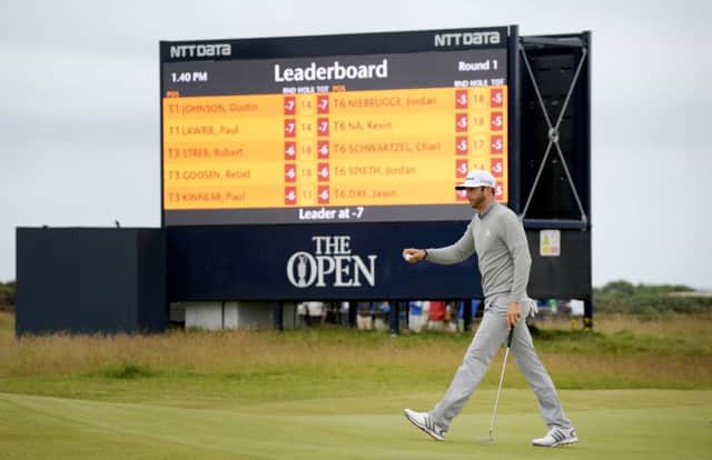 Dustin Johnson strides across the 15th green. Picture: Jane Barlow