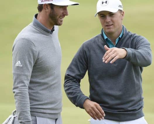 Dustin Johnson chats with Jordan Spieth.Picture: Ian Rutherford