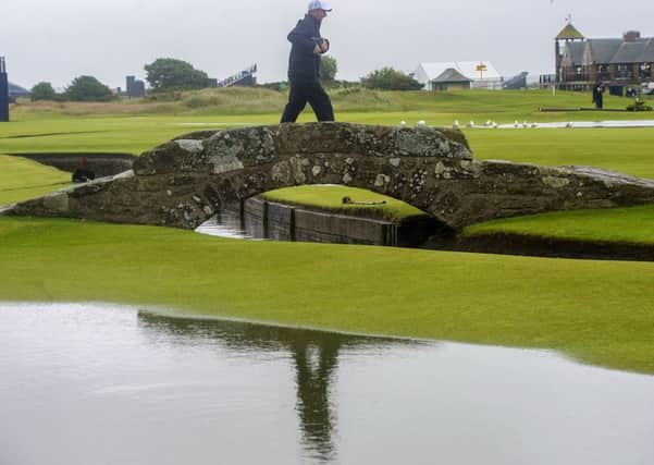 Flooding appears on the course at St Andrews on the second day of The Open. Picture: SNS