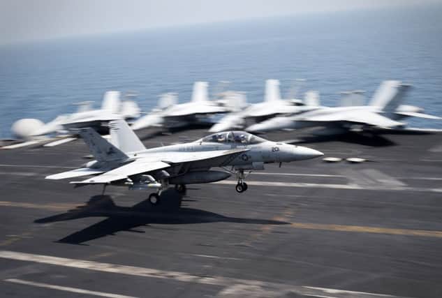 A US Hornet is among aircraft used in the strikes on IS targets. Picture: AP
