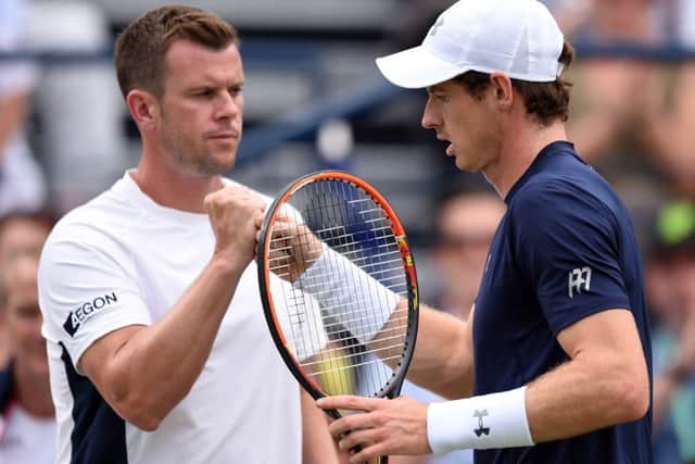 Andy Murray and team captain Leon Smith during yesterdays match against Jo-Wilfried Tsonga. Picture: PA