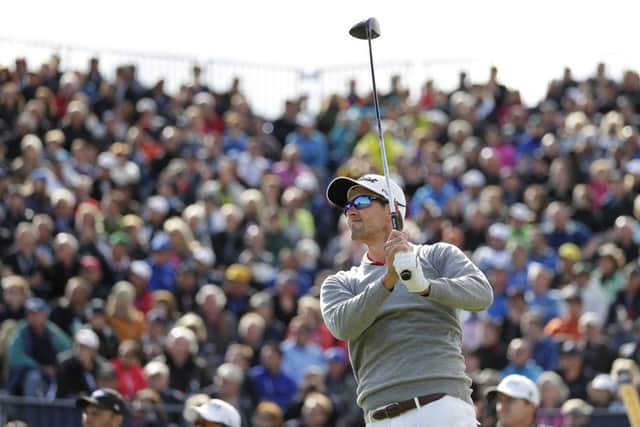 Adam Scott is in contention after shrugging off the weather delay to shoot par 67. Picture: AP