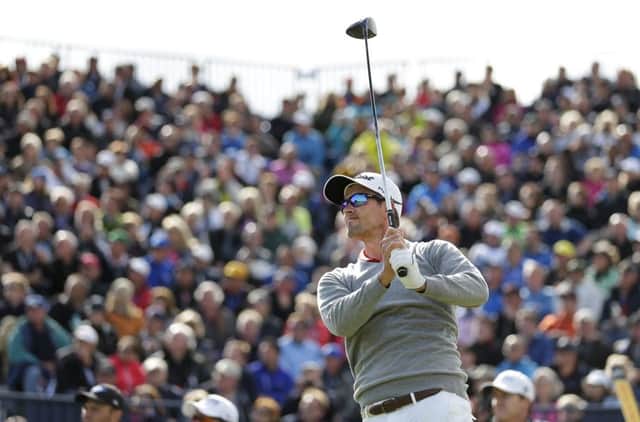 Adam Scott is in contention after shrugging off the weather delay to shoot par 67. Picture: AP