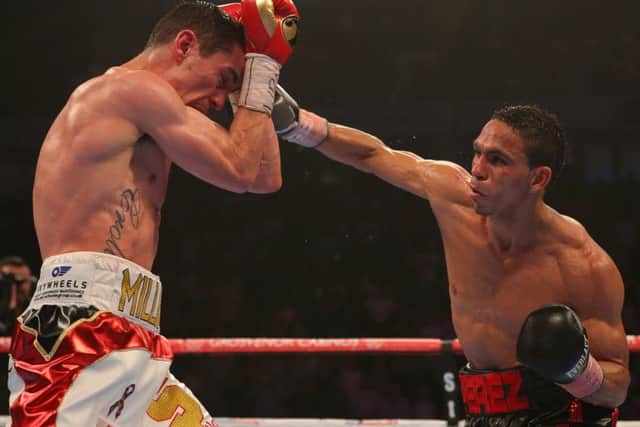 Anthony Crolla goes on the defensive against Darleys Perez in the WBA world lightweight title fight. Picture: Getty