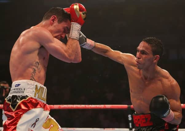 Anthony Crolla goes on the defensive against Darleys Perez in the WBA world lightweight title fight. Picture: Getty