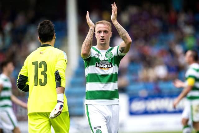 Leigh Griffiths applauds the travelling fans after Celtic strolled to victory in northern Spain. Picture: SNS