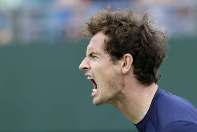 Andy Murray in action against France's Gilles Simon in the Davis Cup at the Queen's Club in London. Picture: AP