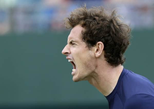 Andy Murray in action against France's Gilles Simon in the Davis Cup at the Queen's Club in London. Picture: AP