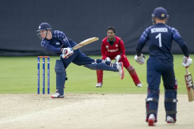 Richie Berrington tries to move the score along during Scotlands nerveshredding 23run win over Oman. Picture: ICC/Donald MacLeod