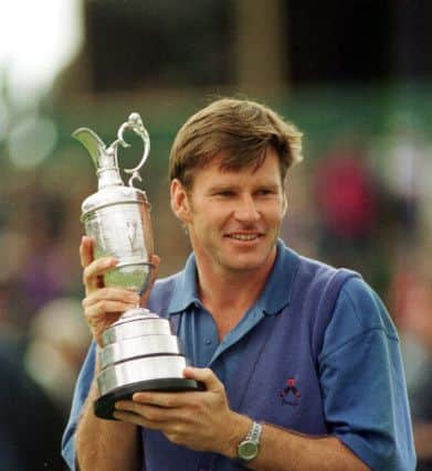 Nick Faldo holds the Claret Jug in 1992. Picture: Ian Rutherford