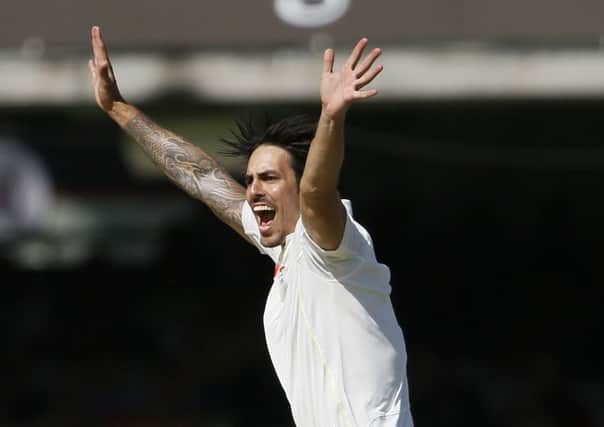 Mitchell Johnson took three wickets for 27 runs and claimed a double-wicket maiden. Picture: AP