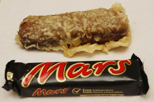 The banner, advertising the deep fried Mars bar, has been outlawed by Aberdeenshire Council. Picture: PA