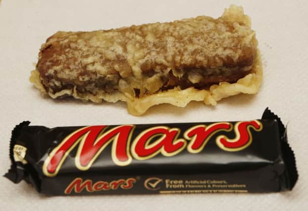 The banner, advertising the deep fried Mars bar, has been outlawed by Aberdeenshire Council. Picture: PA