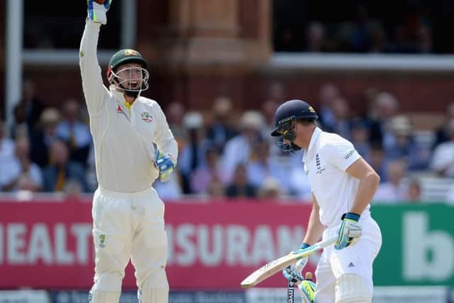Wicketkeeper Peter Nevill celebrates after taking the wicket of Jos Buttler at Lords. Picture: Getty Images