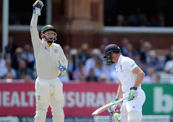 Wicketkeeper Peter Nevill celebrates after taking the wicket of Jos Buttler at Lords. Picture: Getty Images