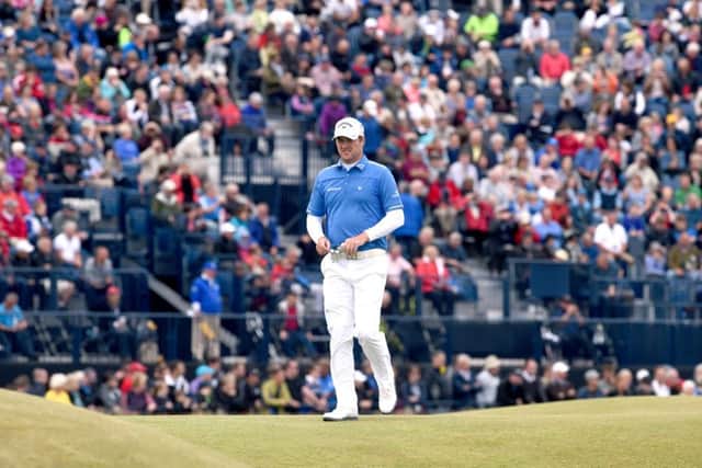 Marc Warren, only three off the pace at halfway, plays the second hole during his final round yesterday. Warren shot a 74. Picture: Jane Barlow