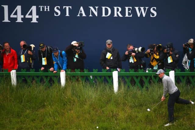 Irishman Paul Dunne finds the going rough as he plays a shot at the 18th during the final round at St Andrews. Picture: Getty