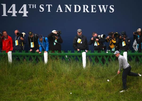 Irishman Paul Dunne finds the going rough as he plays a shot at the 18th during the final round at St Andrews. Picture: Getty