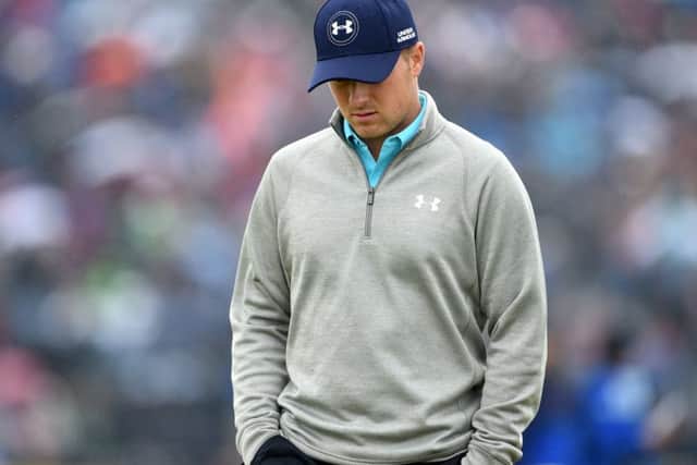 Jordan Spieth in reflective mood on the third tee yesterday as he scraps to stay in contention for the Open title. Picture: Jane Barlow