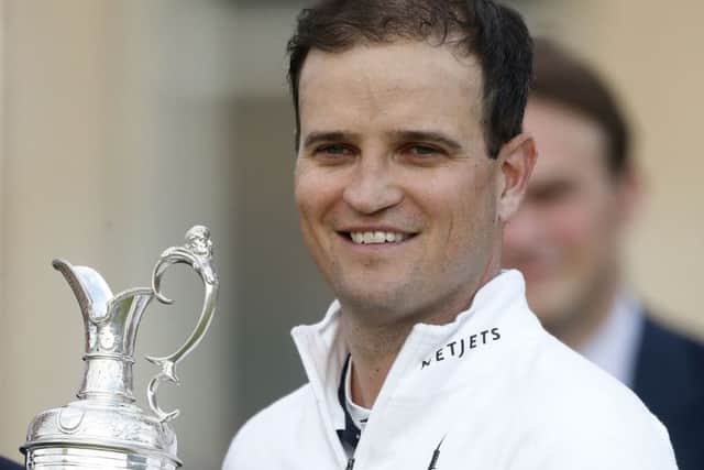 USA's Zach Johnson celebrates with the Claret Jug after winning The Open Championship 2015 at St Andrews. Picture: PA
