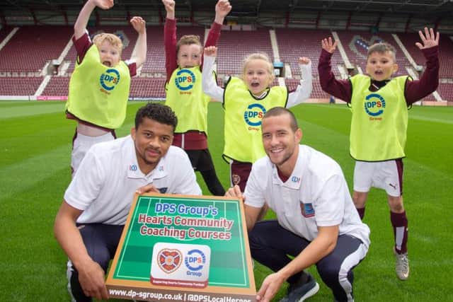 Kenny Anderson, right, with Osman Sow and young fans Ethan White, Ross Gillie, Annie Clark and Harry Walman. Picture: Rob Casey/SNS