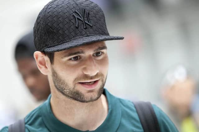 Nadir Ciftci arrives at Glasgow Airport with the Celtic squad ahead of their flight to Iceland. Picture: SNS