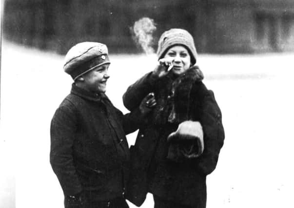 Two children smoking a cigarette in Berlin in 1930. Picture: General Photographic Agency/Getty Images