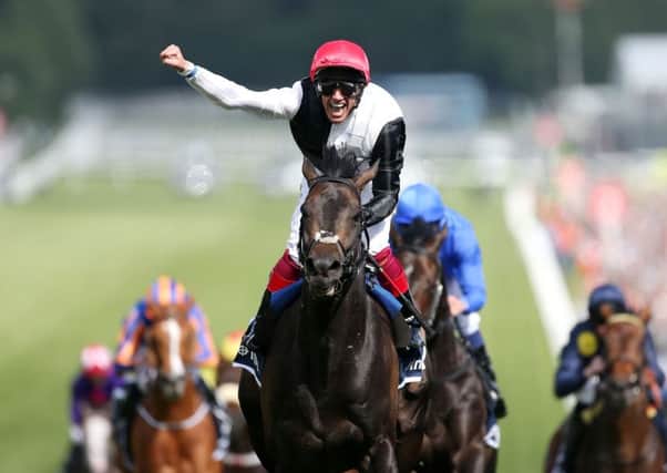 Frankie Dettori punches the air in delight after Golden Horns victory in the Epsom Derby in June. Picture: Getty Images