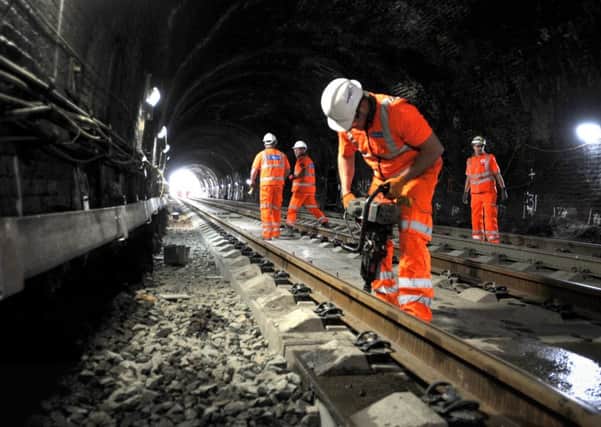 The final stages of work are carried out by railway engineers in the Winchburgh Tunnel, West Lothian. Picture: Jane Barlow
