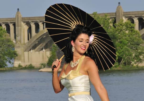 Metaphorically speaking, the weather lady is still out with her parasol. Picture: Getty